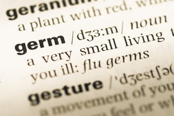 Obraz premium Close up of old English dictionary page with word germ