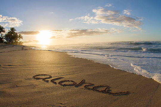 Aloha, written in the sand on beach, Hawaii