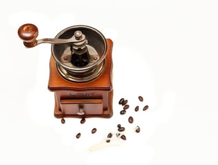 The Vintage Old Stile Wooden Coffee Grinder with Beans of Coffe on the White Background,Top View