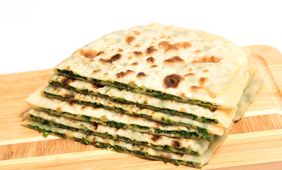 stack tortillas stuffed with herbs