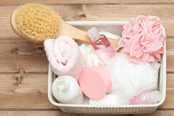 Obraz na płótnie Canvas Shampoo, Soap Bar And Liquid In Basket. Shower Gel. Towels. Spa