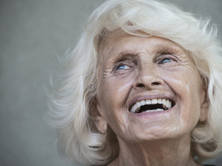 Portrait of senior adult woman, laughing