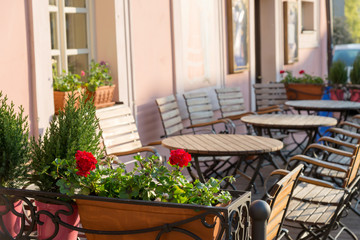 Fototapeta na wymiar cozy outdoor cafe in early morning