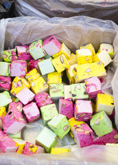 Box of colorful sweets in French market