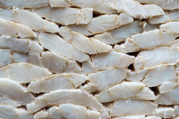 Stand full of salty codfish fillet