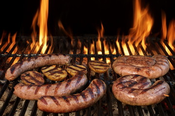 Grilling German Sausages On Hot Barbecue Charcoal Grill.