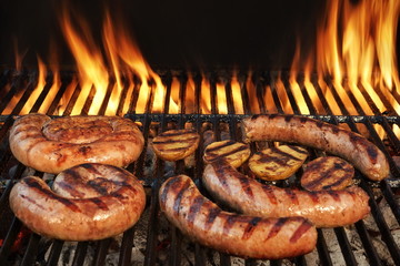 Grilling German Sausages On Hot Barbecue Charcoal Grill.