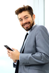 businessman speaking on the phone in office