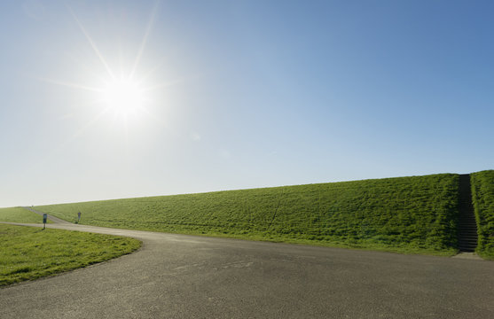 Grassed dyke protecting the polder from the water, Riland, Zealand, Netherlands