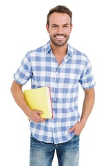 Happy young man holding folder