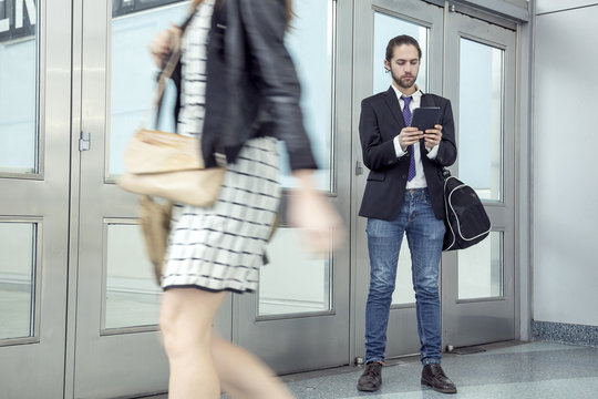 Business people commuting at rush hour