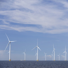 wind turbines in water of ijsselmeer off the coast of flevoland