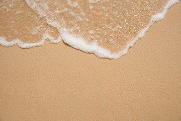 sand beach with water wave.