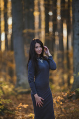 Girl in the autumn forest