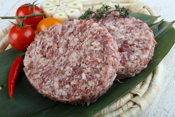 Raw burger cutlet