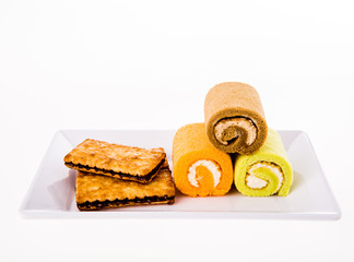 biscuits  and yamroll on white background