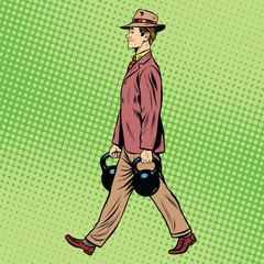 Fitness bodybuilder businessman with kettlebells