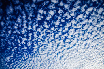 Rippled Clouds and Blue Sky Background