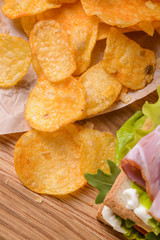 Scattered chips on wooden table