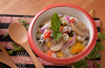 Bowl with rice salad and vegetarian toppings