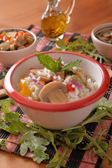 Bowl with rice salad and vegetarian toppings