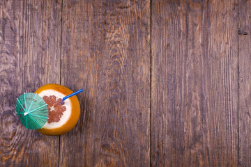 tropical cocktail on the wooden terrace