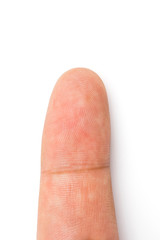 close up of finger print on a human thumb isolated white background