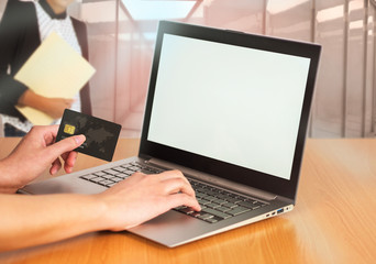 business women online shopping with credit card and laptop computer
