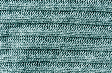 Abstract cyan knitting cloth texture.