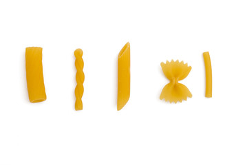 Selection of pasta uncooked on white background 