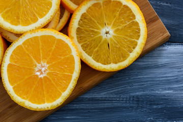 Orange fruit isolated on wooden background