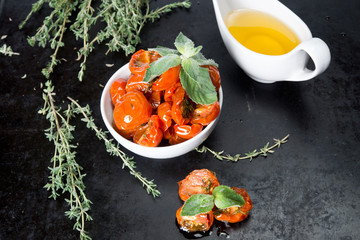Tomatoes dried with herbs in olive oil 