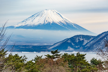 The beautiful Fuji mountain form the five peaceful lake in winter. Japan
