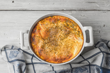 Moussaka in the ceramic pan top view