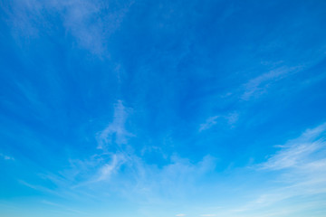 Fototapeta na wymiar Blue sky with tiny clouds