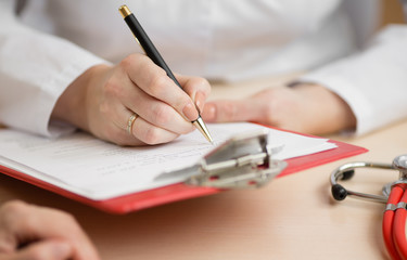 Doctor's desk during patient's consultation in office