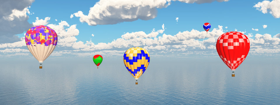 Heißluftballone über dem Meer