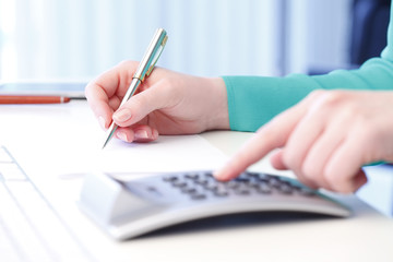 Businesswoman working on financial plan