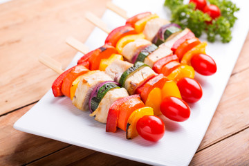 Barbecue chicken grilling on grill pan.