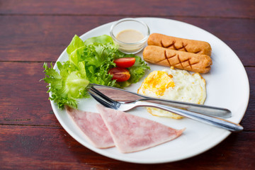 Breakfast foods with hotdogs ,egg and bacon in the morning