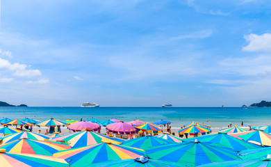 Many umbrellas on a tropical beach