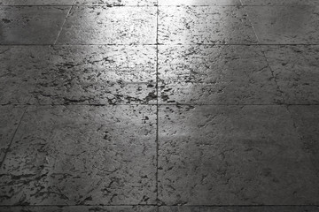Shining ancient gray stone floor tiling