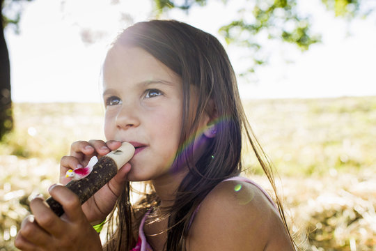 Girl playing on flute