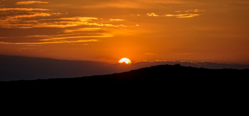 Sunset over the hill from Hungary