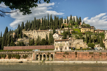 Naklejka premium View of Torricelle on the river Adige - Italy