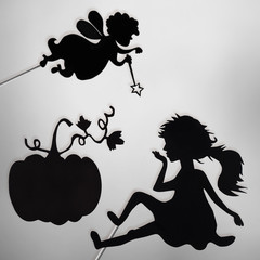 Fairy Godmother, Cinderella and Pumpkin shadow puppets, black and white