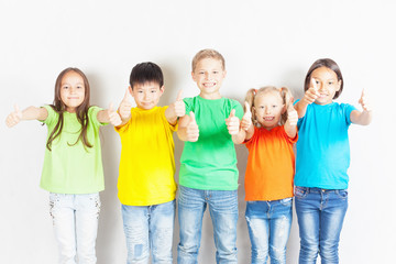 Fototapeta premium Group of international kids holding globe earth