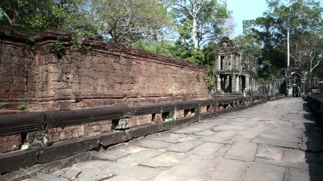 Preah Khan it is translated as A sacred sword. Trees and ruins of the temple, Siem Reap, Cambodia