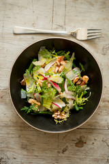 Overhead of Dining Fork and A Bowl of Light Vegetable Salad