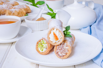 Homemade cannoli stuffed with ricotta cheese cream